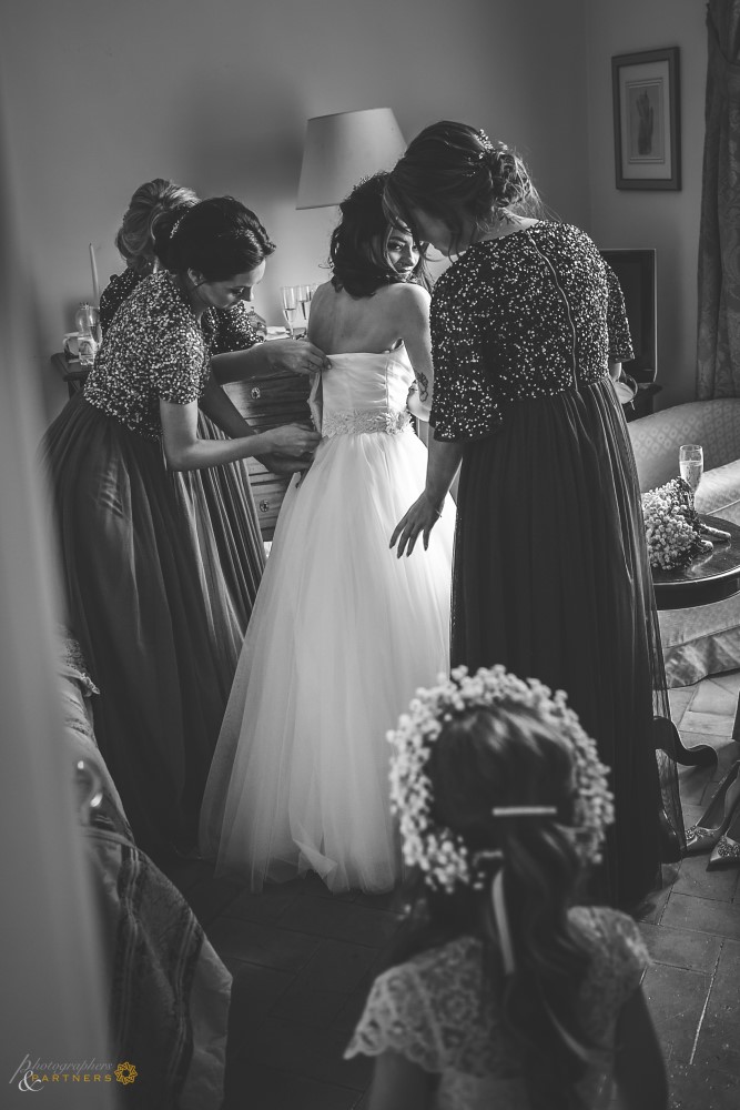 Closing of the bride's dress.