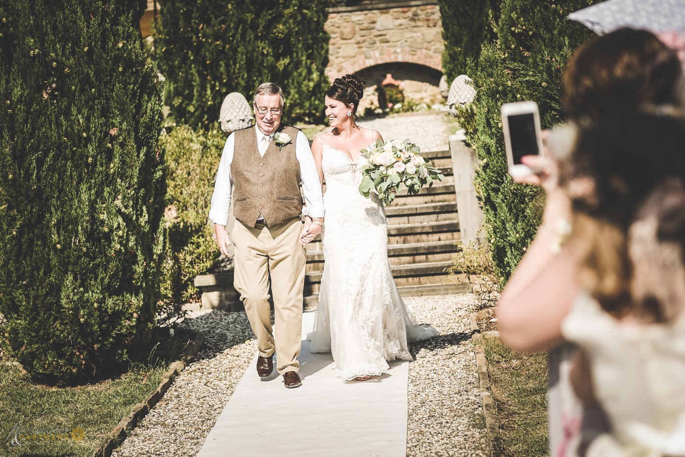 The bride arrives.