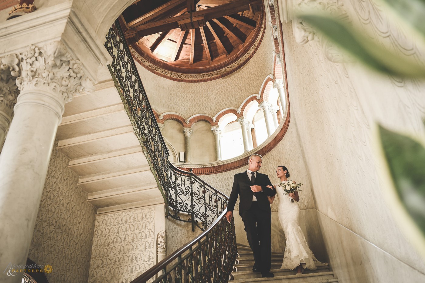 The bride with the father.