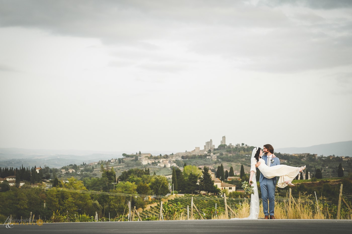 A panoramic photo with San Gimignano in the background.