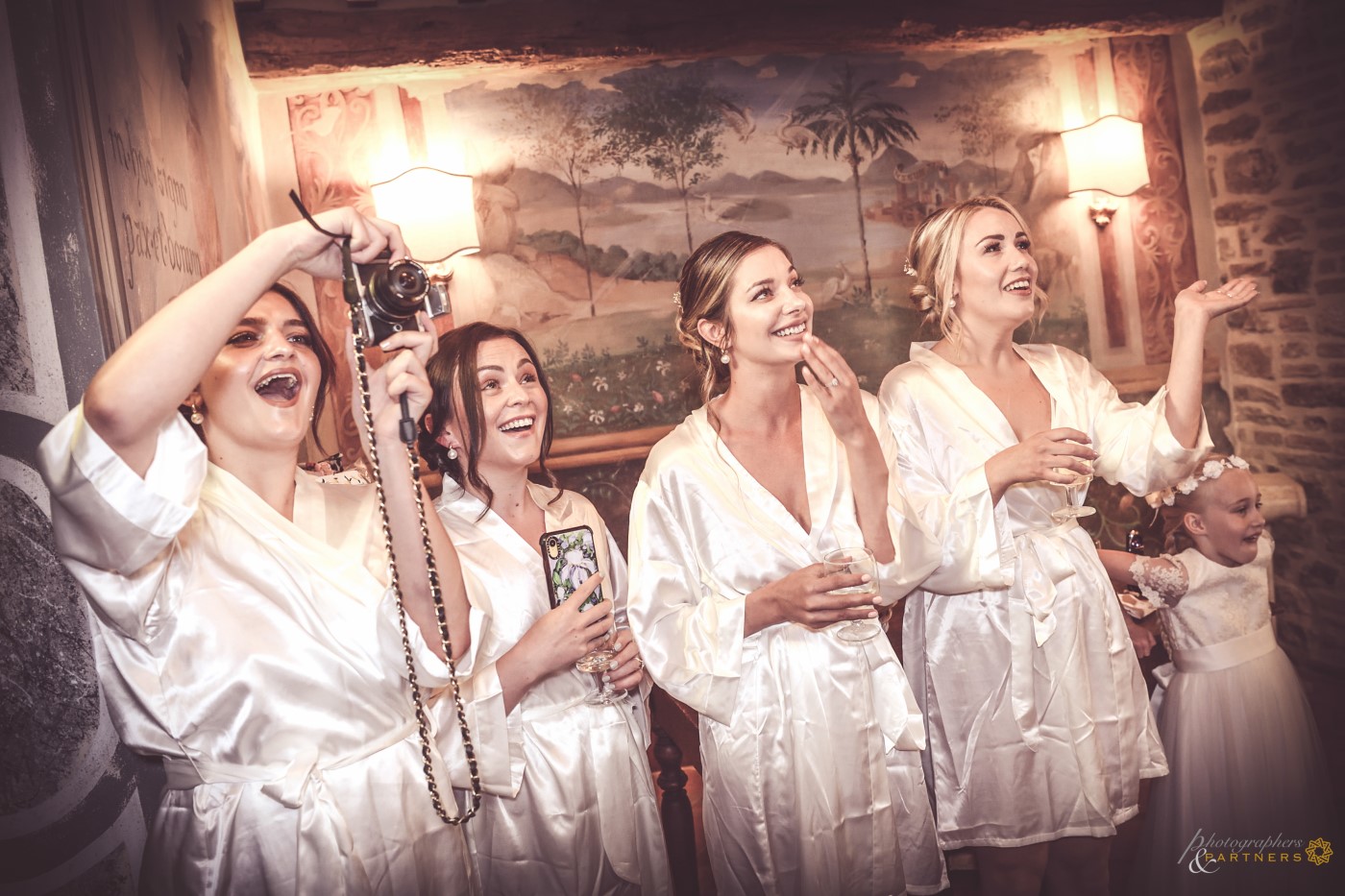 The reaction of the bridesmaids.