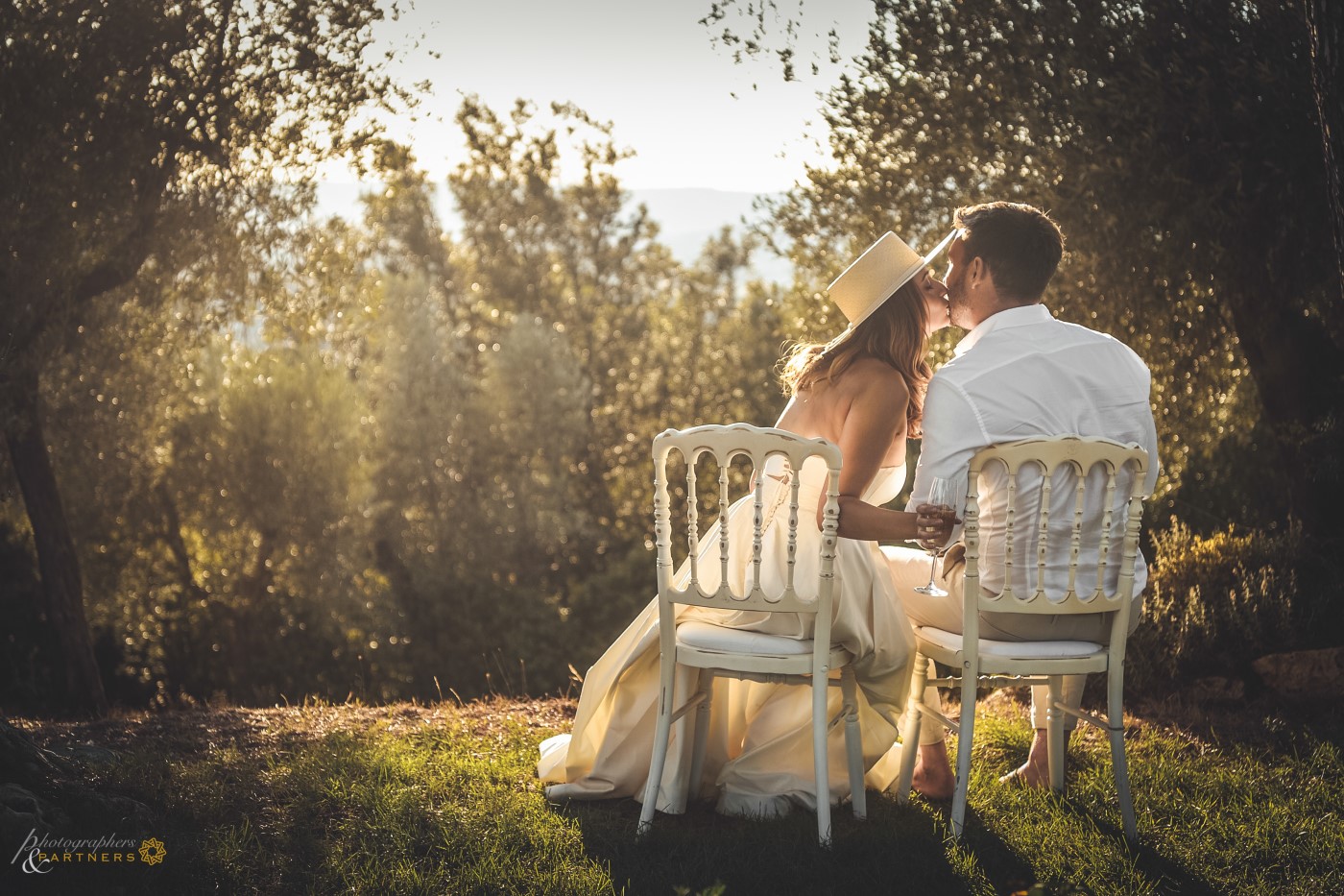 Romantic kiss at sunset